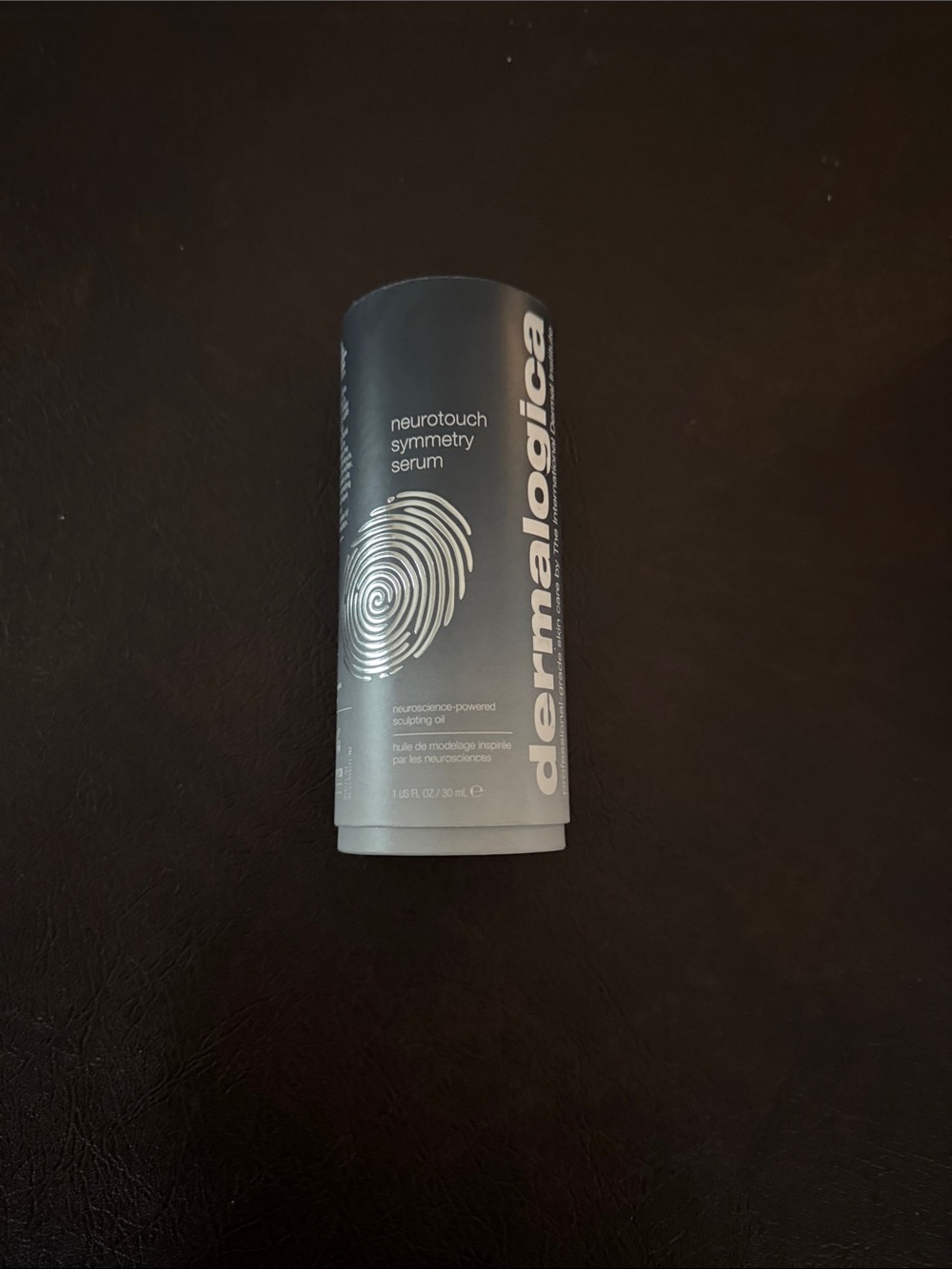 Dermalogica gray Neurotouch Symmetry Serum tube with silver graphic